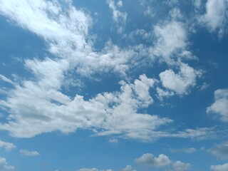 Naklejka na ściany i meble Charming and clear blue sky with beautiful clouds