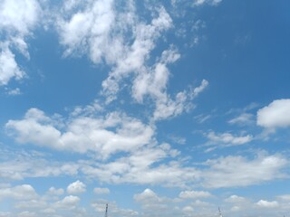 Charming and clear blue sky with beautiful clouds
