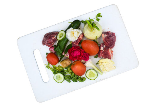 Vegetables and Eat Raw Meat  vintage border on cutting boardwith onion, tomato, cocomber, Garlic on white cutting board, Ginger  un cooked Pakistan, Healthy vegetables and ingredients on wooden cuttin