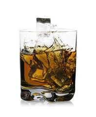 Naklejka premium Whiskey splashing out of glass on white background