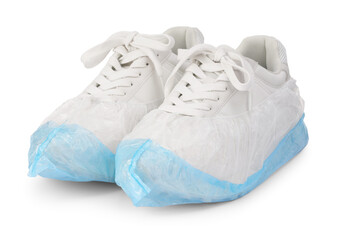 Sneakers in shoe covers isolated on white