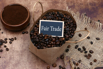 	Coffee beans in a shopping bag with the text Fair Trade on a label.