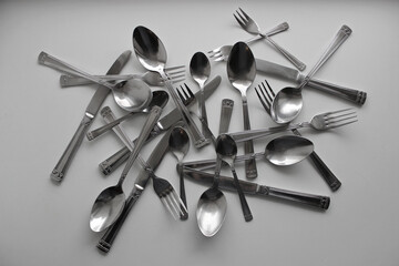 Disordered Items From One Cutlery Set On Clean White Surface Stock Photo For Table Setting...