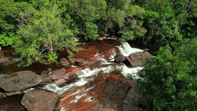 Waterfall amidst lush green forest, a stunning natural landscape Phu Quoc Vietnam Khu du lich sinh thai Suoi Da Ban