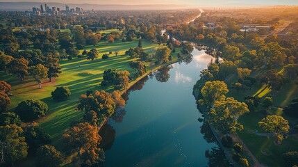 Aerial view of Adelaide, city parks and rivers intersecting, serene dusk
