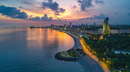Aerial view of Baku, modern architecture and Caspian Sea, evening lights