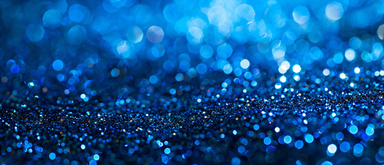 Shiny Blue Glitter In Abstract Defocused Background