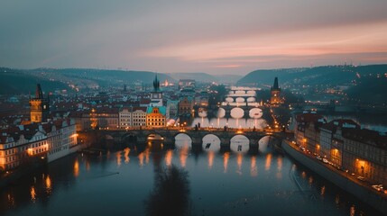 Aerial view of Prague, historic bridges over the Vltava River, twilight