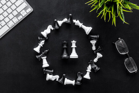 Competition in business. Chess pieces on office table, top view