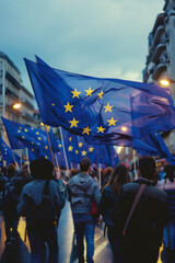 people carrying european flags - 789185073