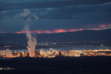 Night view of Grangemouth petrochemical works and cloud of smoke. Grangemouth, Scotland