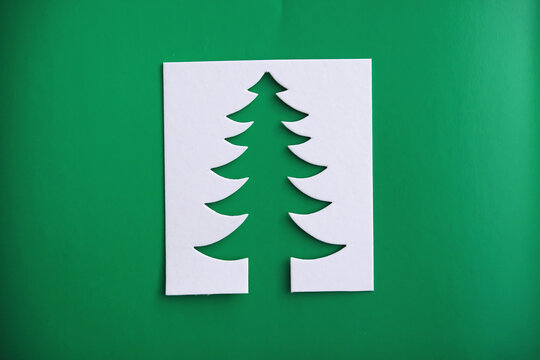 Christmas tree paper cutting design papercraft card.