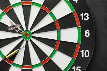 Darts. The dart for playing in the game board is stuck. Hit the sector in darts. The concept of a...
