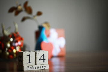 Wooden calendar show of February 14 with red heart