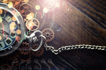 Old clock macro. Old mechanical clock gears and cogwheels on wooden background
