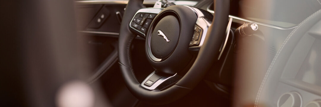 Jaguar F type steering wheel. 5.0L engine, 575 hp. Katowice. Shallow depth of field.June 17, 2022