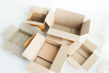 Open cardboard box on white background,delivery unboxing concept.