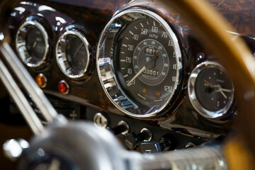 Close up of an old vintage car dashboard.