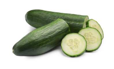 Halves and slices of long cucumber isolated on white
