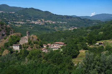 Fototapeta na wymiar Summer landscape along the road from Castelnuovo Garfagnana to San Romano, Tuscany