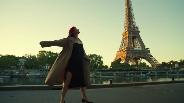 Person in Red Beret Overlooking the Eiffel Tower