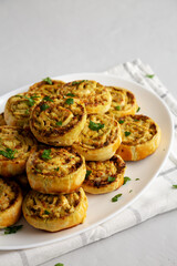Homemade Chicken Pesto Pinwheels on a Plate, side view. Copy space. - 789225233