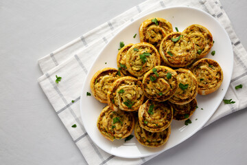 Homemade Chicken Pesto Pinwheels on a Plate, top view. Flat lay, overhead, from above. Copy space. - 789225643