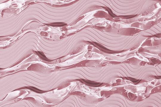 Abstract pink gel waves as a smooth texture