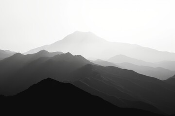 Obraz premium Tranquil black and white image highlighting the minimalist beauty of layered mountain silhouettes