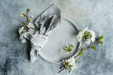 Elegant cherry blossom themed table setting for spring
