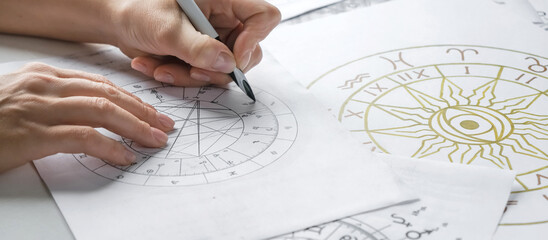 Astrology. Astrologer calculates natal chart and makes a forecast of fate.Tarot cards, Fortune...