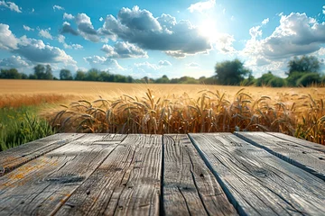 Foto op Canvas Table with view of wheat fields in summer with copy space © krishnendu