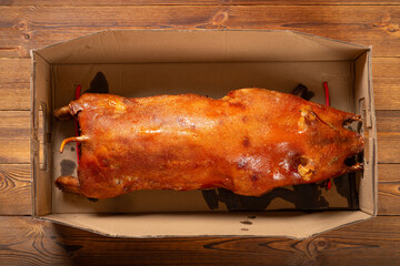 top view roasted whole pig at horizontal composition