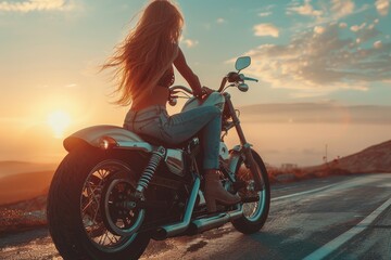 A sense of freedom pervades as a woman rides a motorcycle against a captivating sunset backdrop