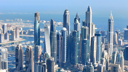 Aerial view of Dubai Marina. Dubai Marina is an affluent residential neighborhood known for The Beach at JBR.	 - 789246617