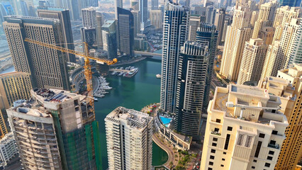 Aerial view of Dubai Marina. Dubai Marina is an affluent residential neighborhood known for The Beach at JBR.	 - 789246691