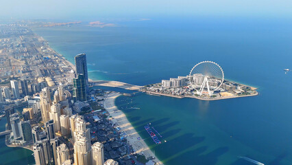 Aerial view of Dubai Marina. Dubai Marina is an affluent residential neighborhood known for The Beach at JBR.	 - 789246696