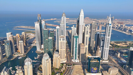 Aerial view of Dubai Marina. Dubai Marina is an affluent residential neighborhood known for The Beach at JBR.	