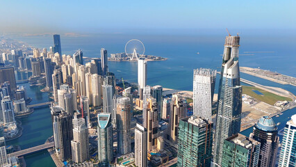 Aerial view of Dubai Marina. Dubai Marina is an affluent residential neighborhood known for The Beach at JBR.	 - 789246892