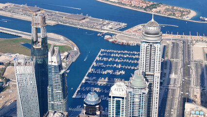 Aerial view of Dubai Marina. Dubai Marina is an affluent residential neighborhood known for The Beach at JBR.	 - 789247022