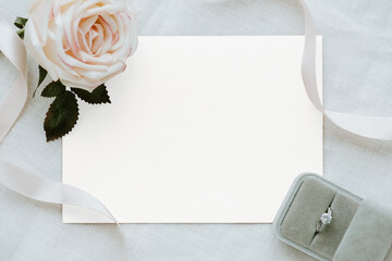 Botanical wedding card mockup by a proposal ring box