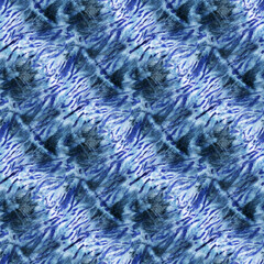 Seamless tie-dye pattern of indigo color on white silk.