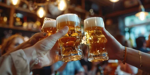 Foto op Canvas Closeup of hands toasting beer glasses in bar with friends during evening party, celebrating and having fun together,, people cheering, cheers, happy moment, nightclub,  © Nice Seven