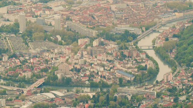 Aerial establishing shot of historic centre of Grenoble and the eastern part of the city, France