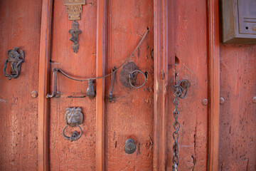 Traditional Ottoman Houses and historical inn doors in Manisa. Kula is on the UNESCO World Heritage List. Old wooden mansions Turkish architecture. Kula historical wooden and metal doors.