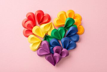 Unity in diversity concept. Top-down view of multicolored heart formed by numerous hearts,...