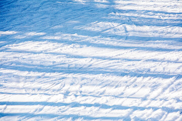 skiers on a snow slope for beginners on a sunny day. active recreation - obrazy, fototapety, plakaty