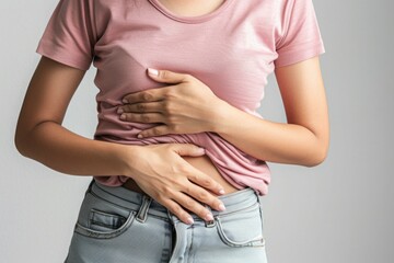 The woman's hands on her stomach were a telltale sign of the persistent stomach pain she had been enduring for days