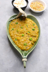 Healthy Quinoa dal khichdi. Made with quinoa, lentils, veggies, and spices, this quinoa dal khichdi is a one pot nutritious weight loss meal. Served with yougurt or curd. Copy Space