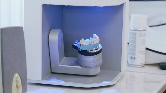 Scanning a denture in a dental laboratory to reproduce the patient's oral anatomy. Dental equipment, laboratory scanner system